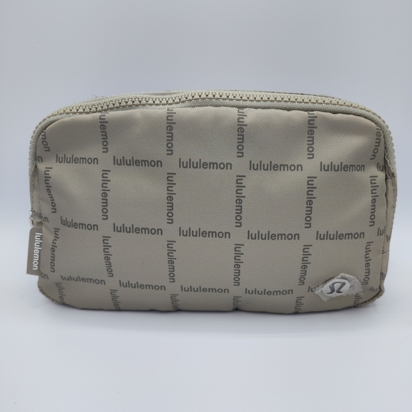 lululemon athletica Handbags - 🔥 NWT Lululemon Everywhere Belt Bag – Light Gray Logo Print